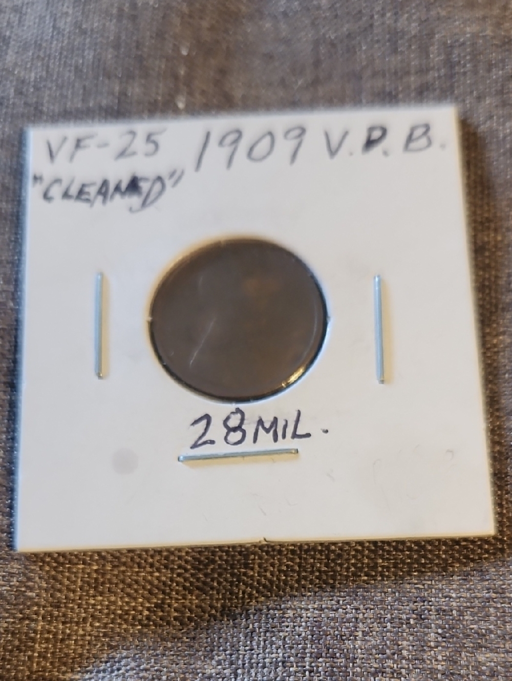 1909 V.P.B. Coin in White Card Holder - Brown/Tarnished